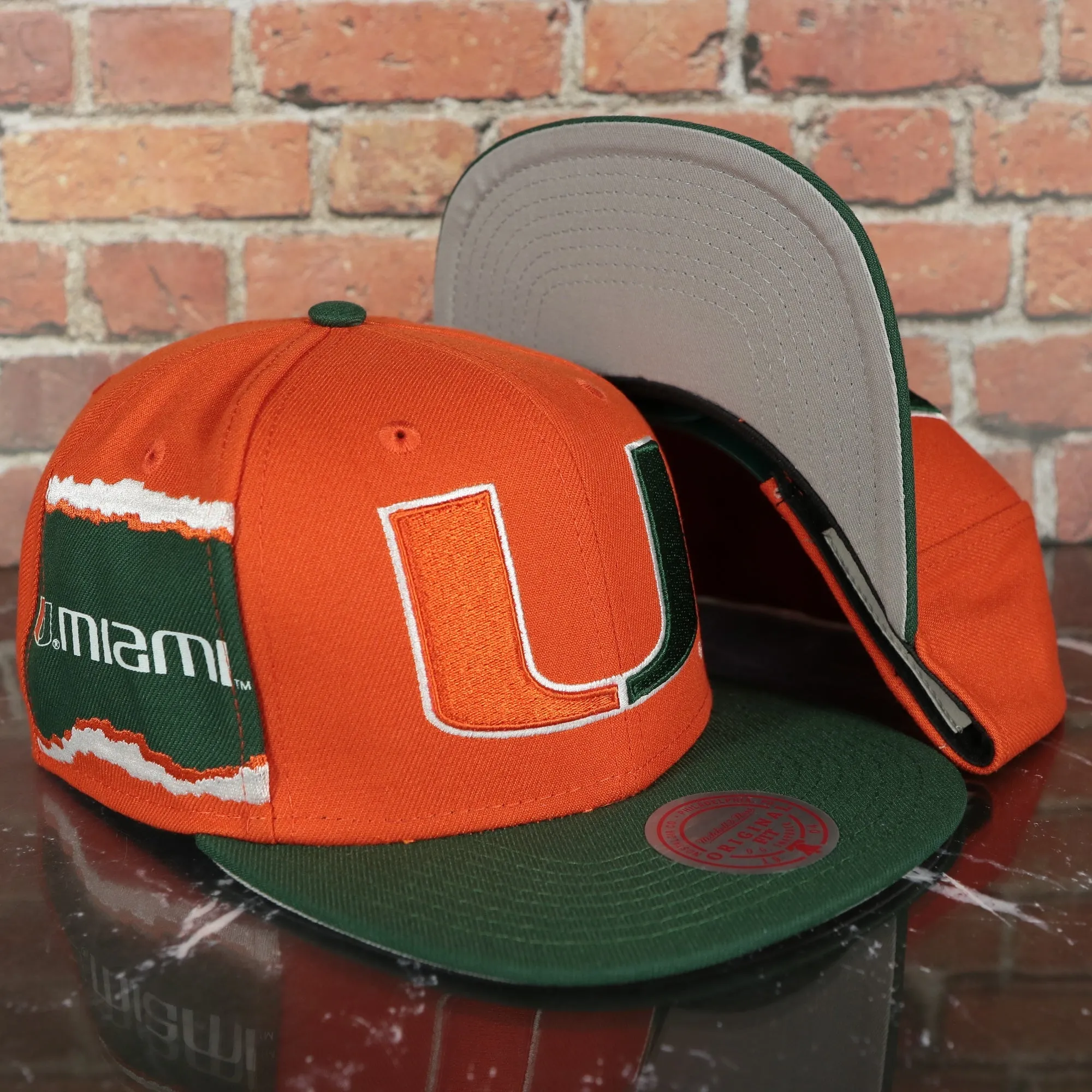 Miami Hurricanes NCAA Jumbotron U Miami Ripped Wordmark side patch Grey Bottom Orange/Green Snapback hat | Mitchell and Ness Two