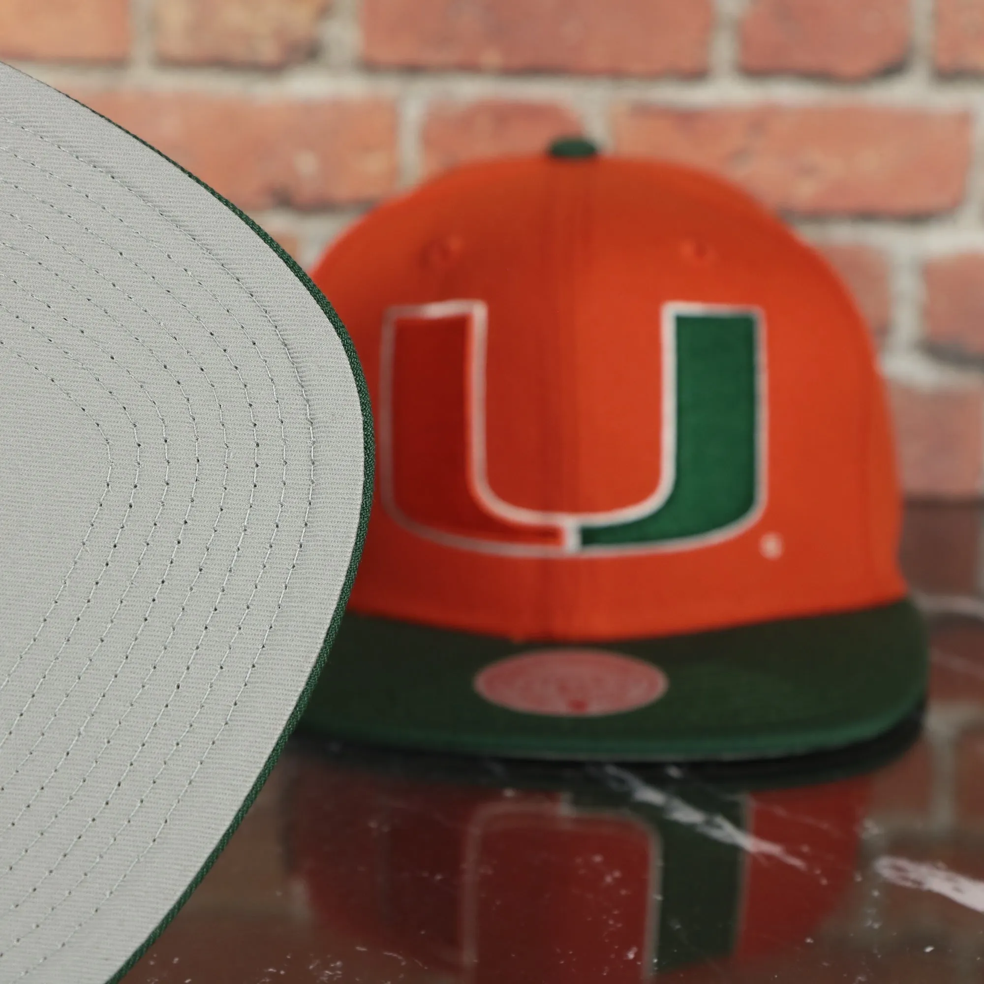 Miami Hurricanes NCAA Jumbotron U Miami Ripped Wordmark side patch Grey Bottom Orange/Green Snapback hat | Mitchell and Ness Two